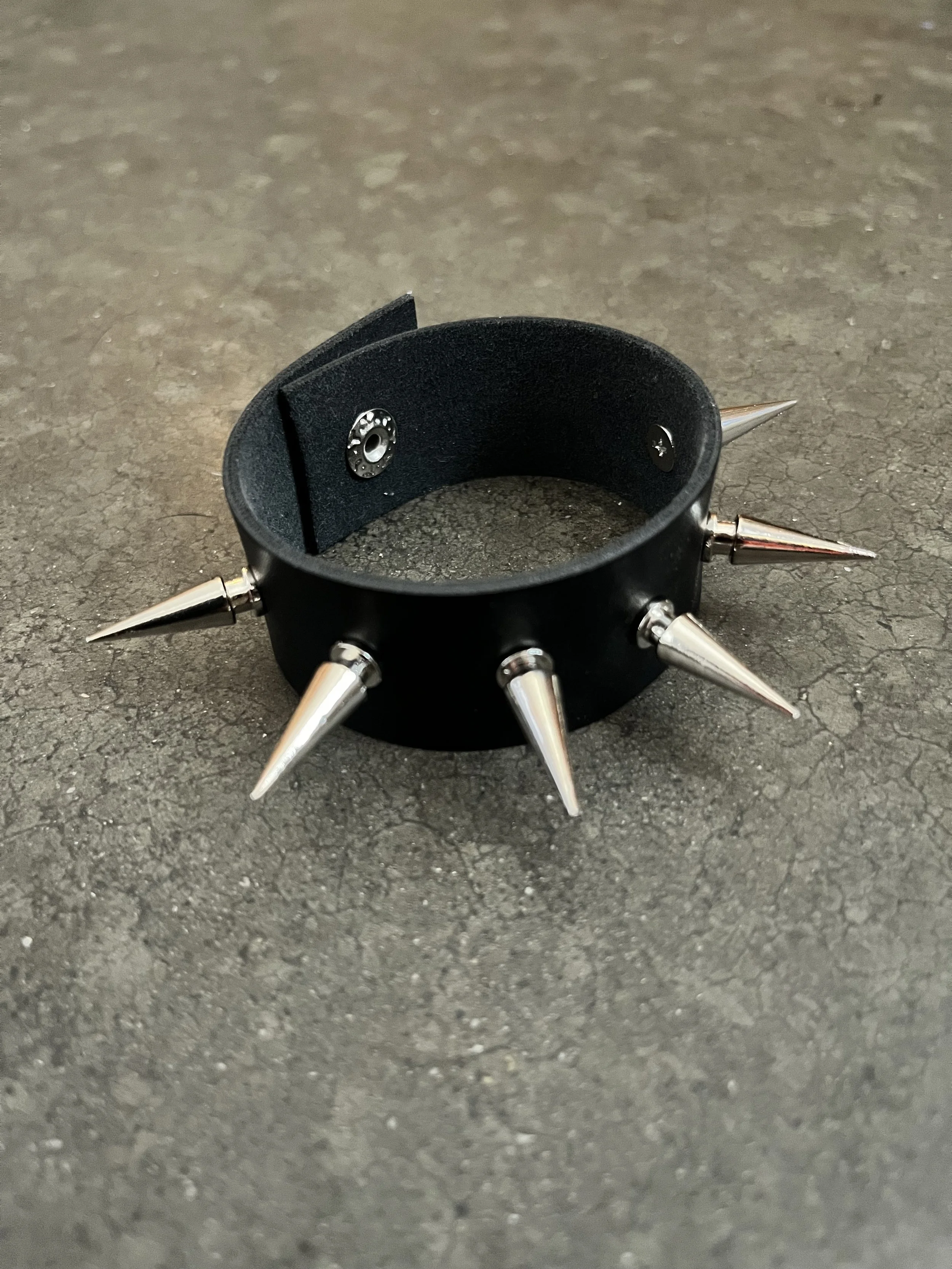 Handmade fake leather studded bracelet.