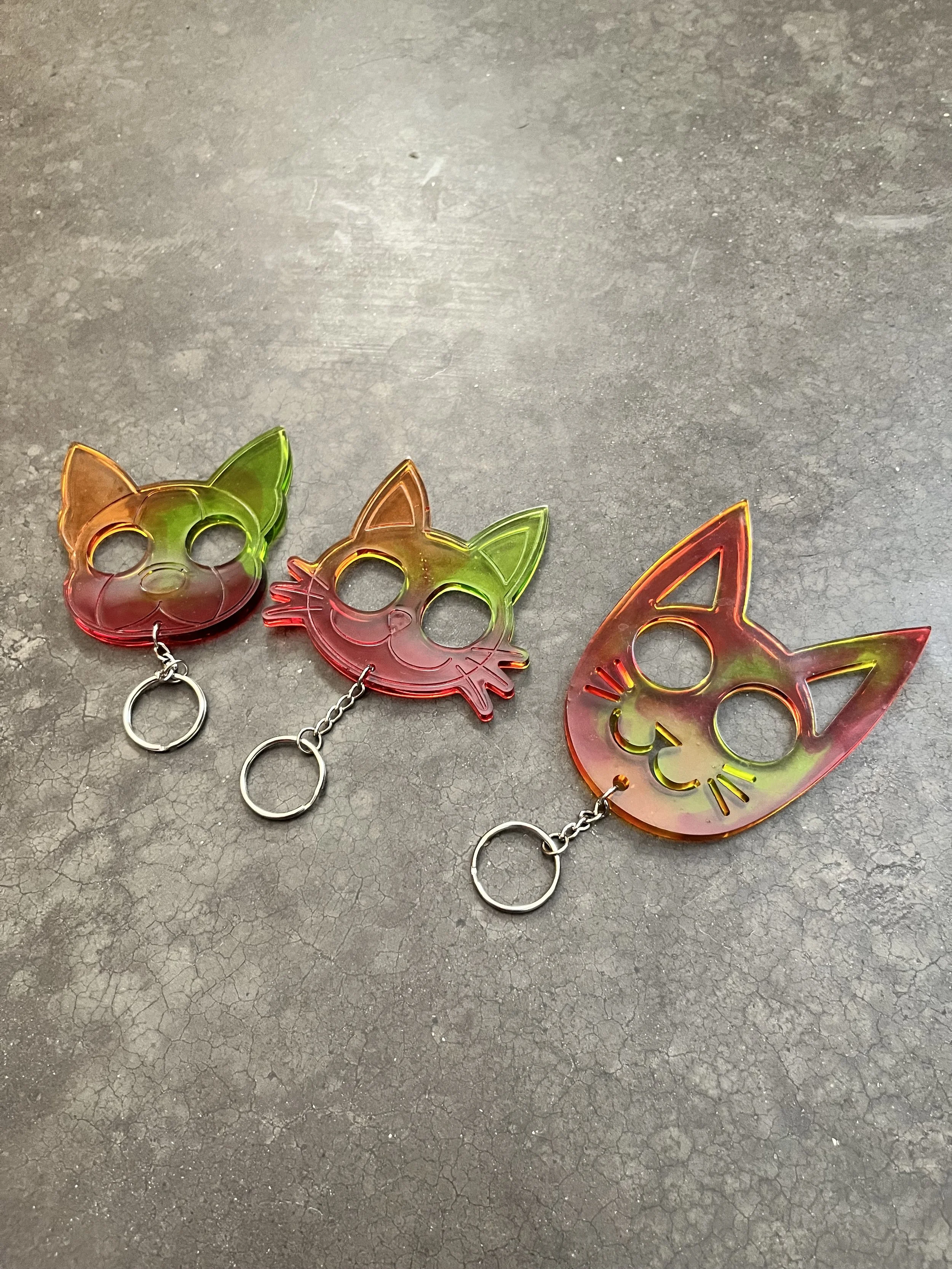 Handmade red,yellow, and green resin epoxy emergency keychains.