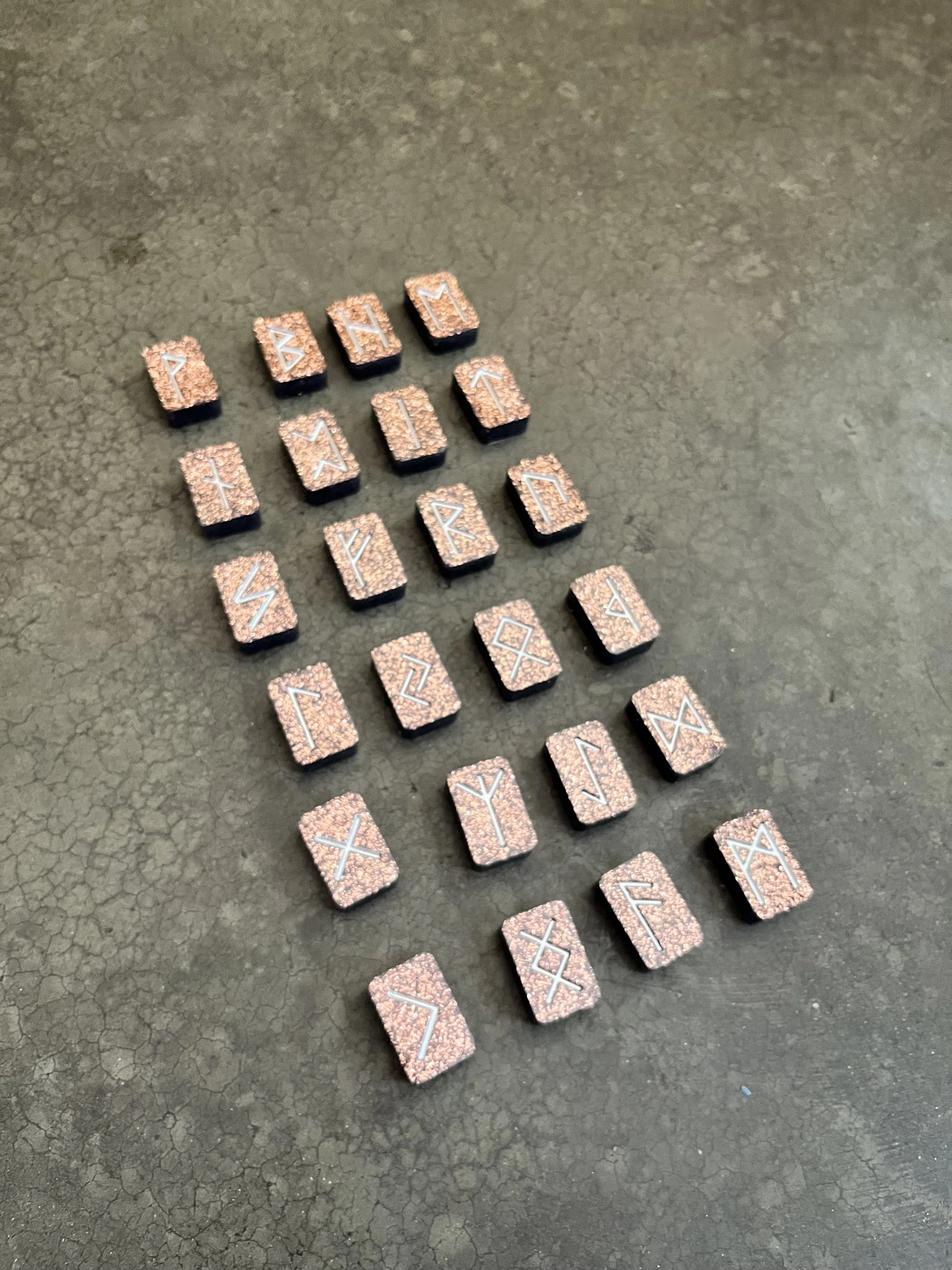 Rune stones made from resin epoxy.