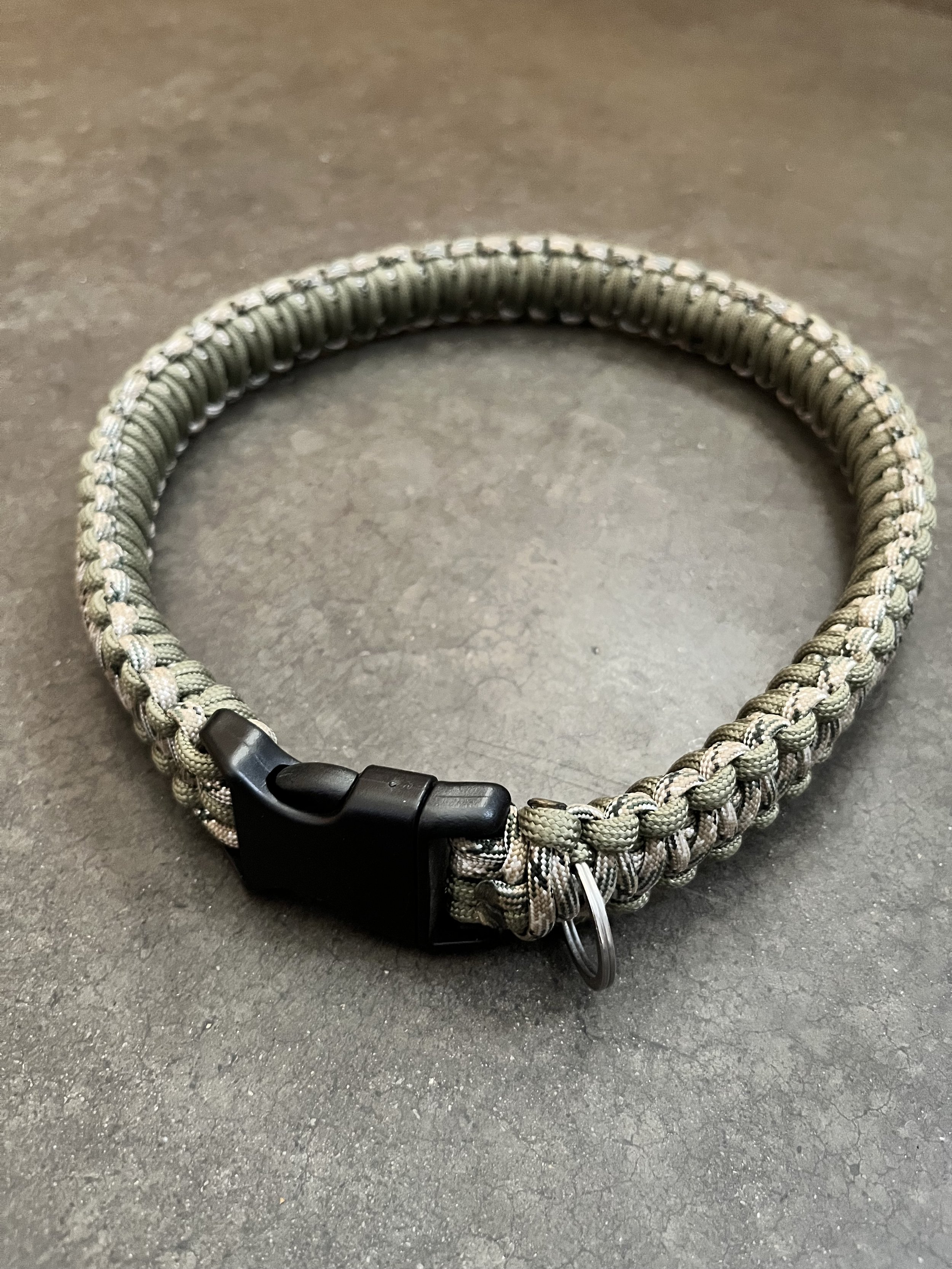 A handmade paracord braided dog collar.