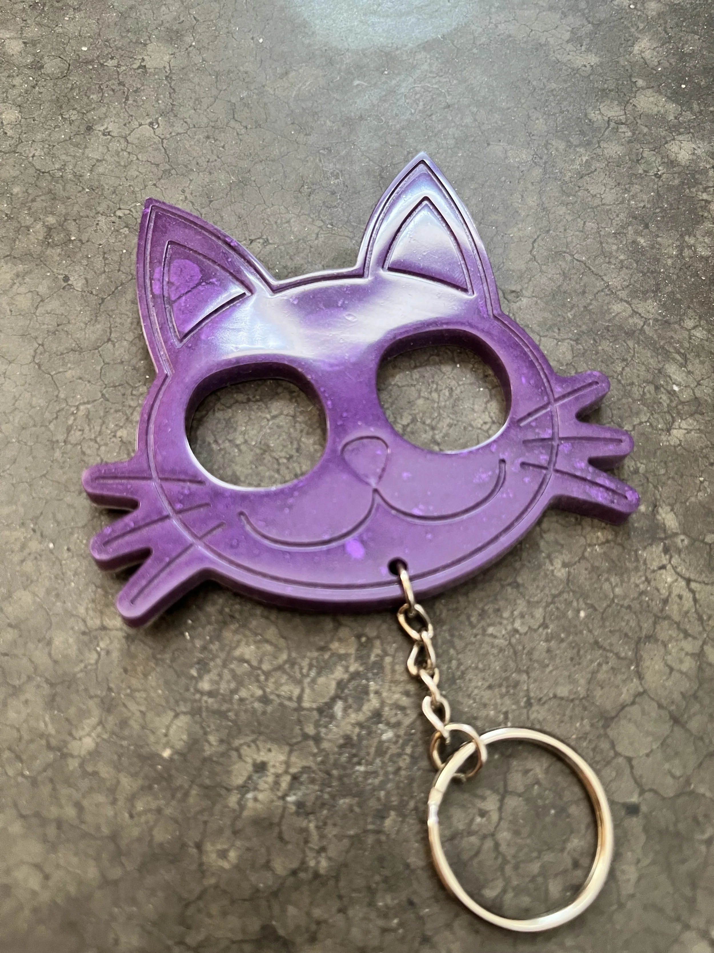 Handmade purple cat shaped resin epoxy emergency keychain.