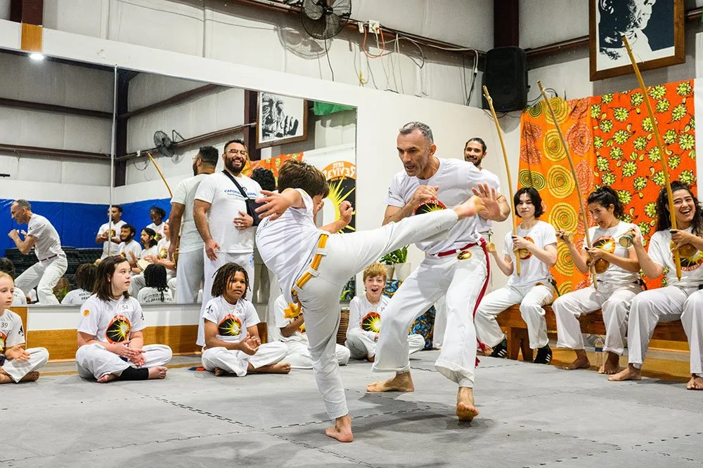 Capoeira class promoting wellness, movement, and self-expression