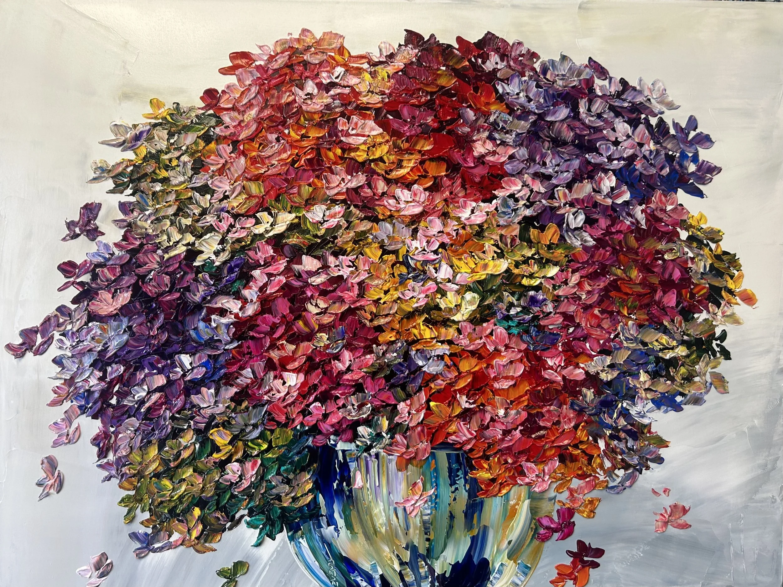 A colorful impressionistic painting of a bouquet of flowers in a vase, with bold, textured brushstrokes and vibrant colors.
