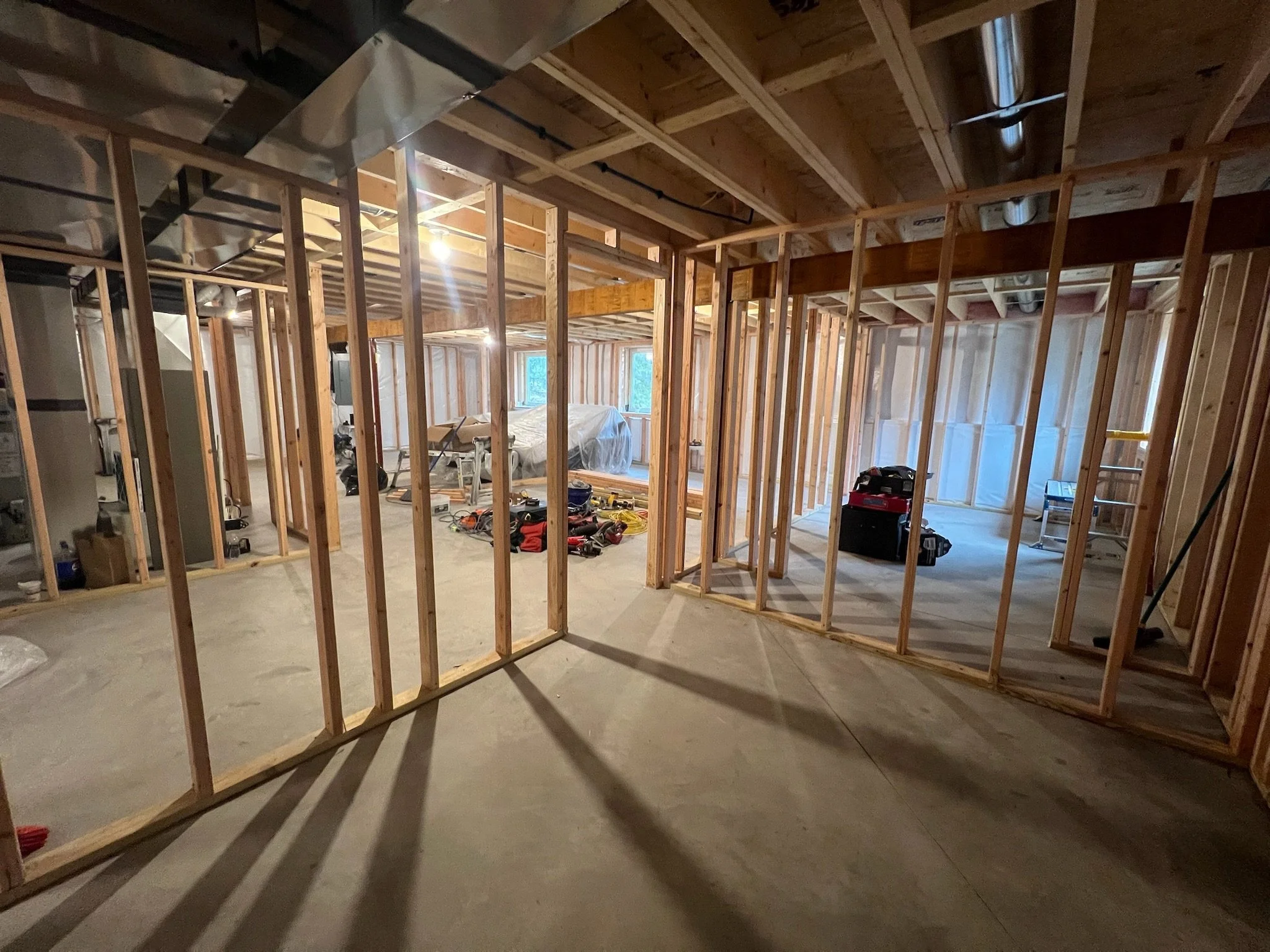 studs erected in the midst of a basement remodel project for a private residence home