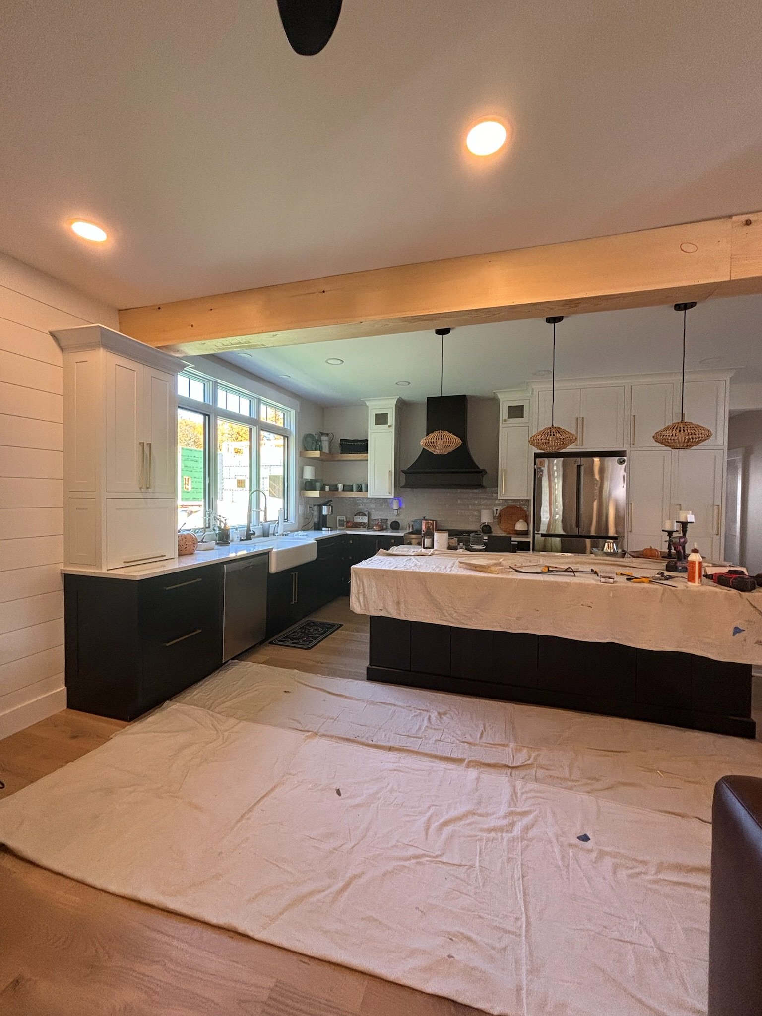 a newly remodeling kitchen gets painted