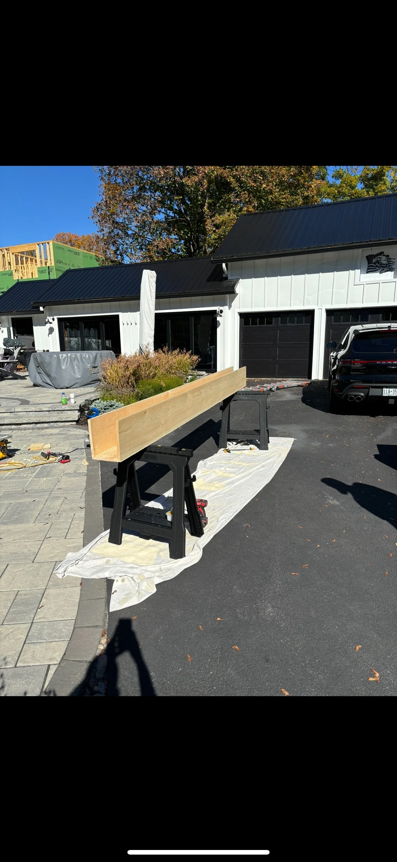 custom home build beam for main entryway
