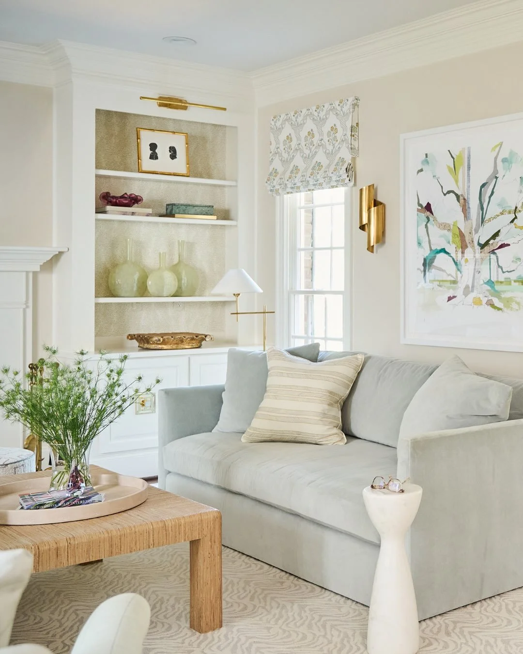 A living room is built in layers. Fabric, texture, color create the kind of warmth and dimension that makes a room feel lived in, not just designed.