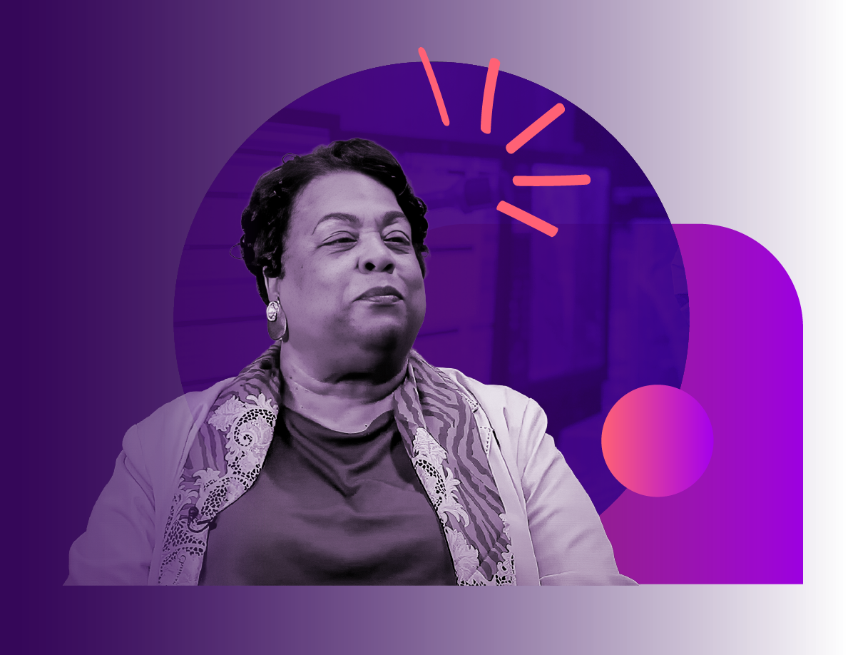 A black and white photo of a middle-aged woman with short curly hair, wearing a patterned scarf and earrings, set against a purple digital background with abstract shapes and pink lines above her head.