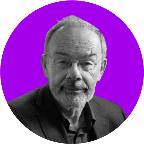 A black and white portrait of an older man with glasses, a beard, and short curly hair, wearing a dark blazer, set against a purple background.