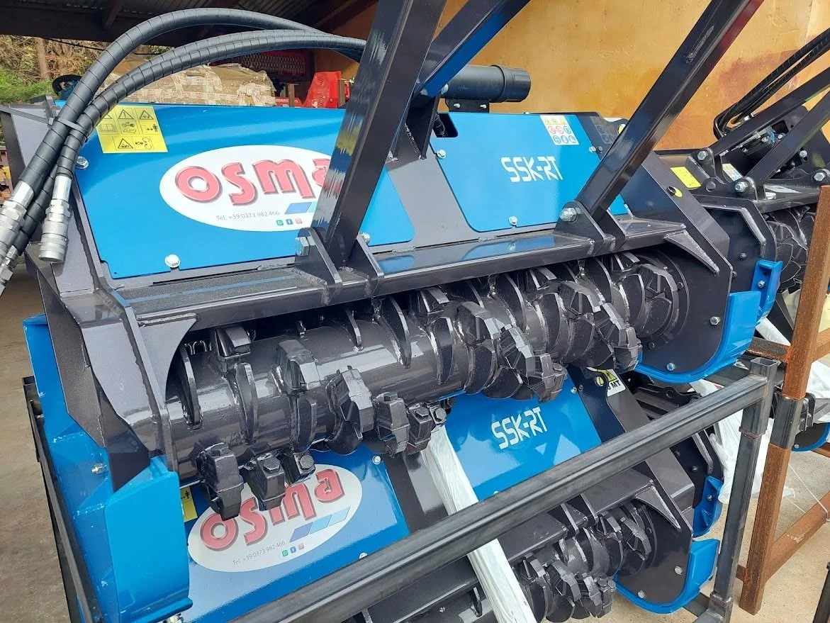 Low flow OSMA SSK-RT forestry mulcher in stock and ready to go. Reliable Italian-built mulching attachment for skid steer loaders and land management contractors.