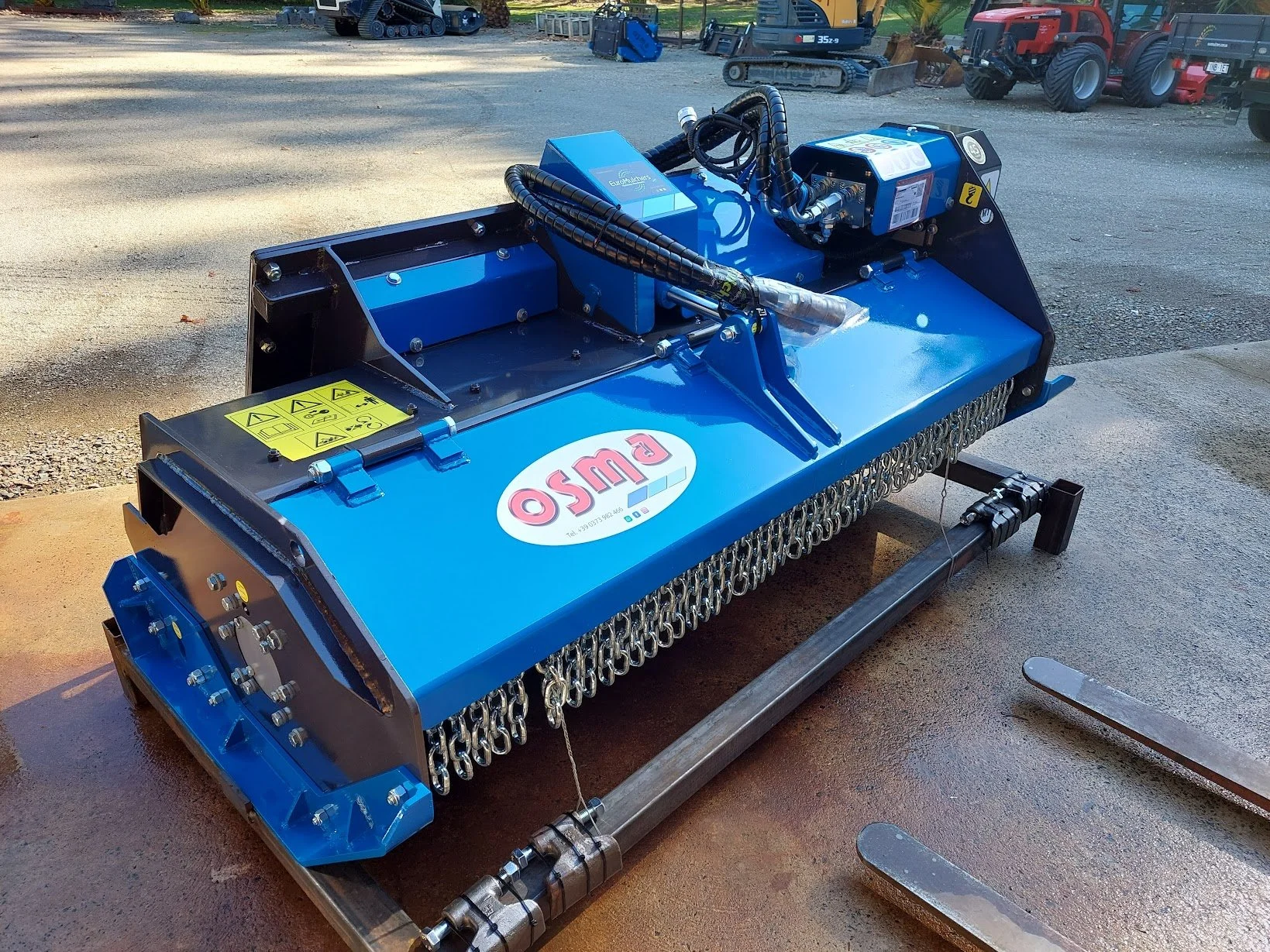 OSMA SF semi forestry mulcher displayed for sale by Eastern Attachments.