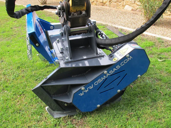 OSMA forestry mulcher mounted on an excavator clearing dense vegetation and scrub in Australian conditions.