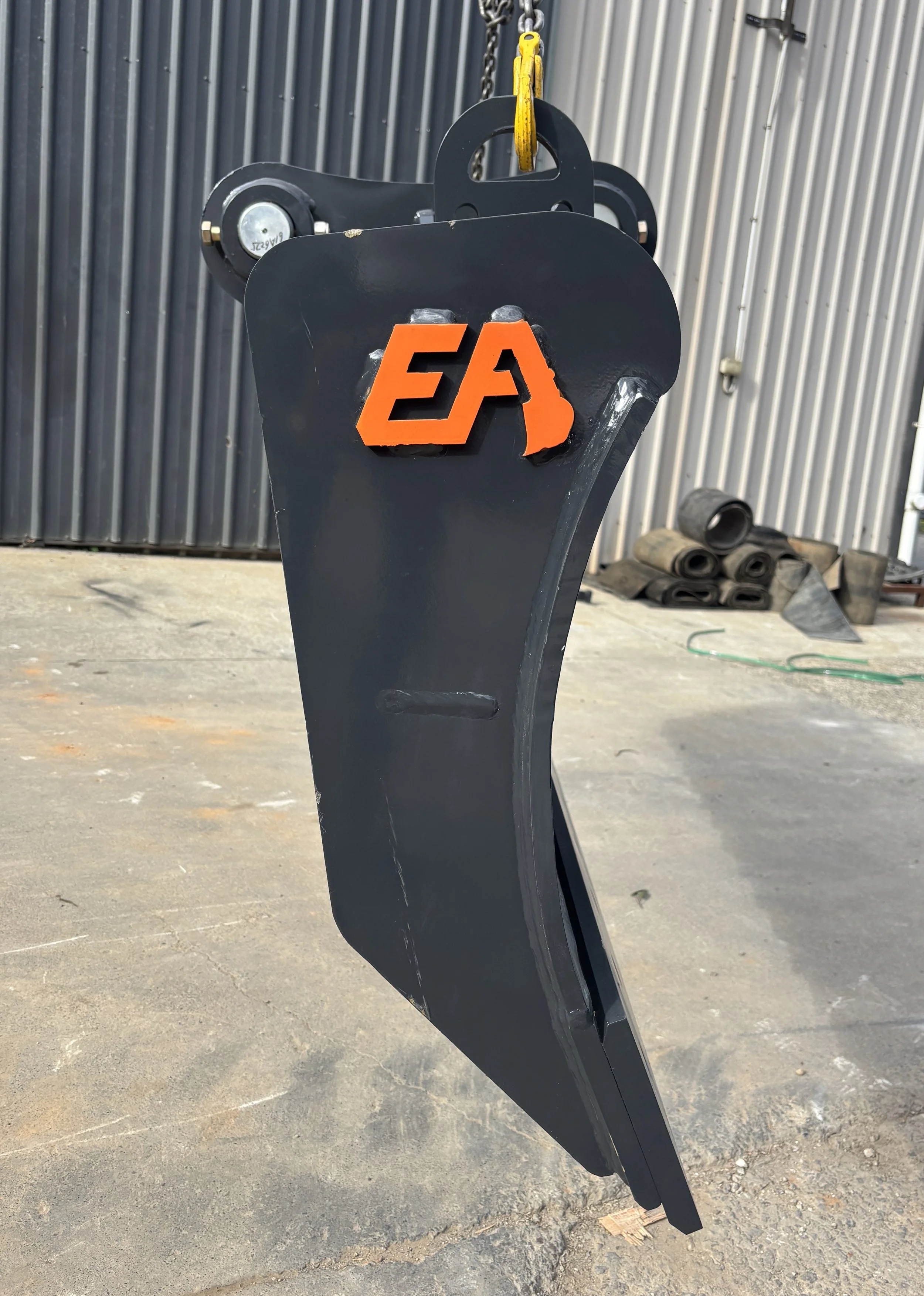 Side view of an excavator batter blade built for accurate grading, batter trimming and surface preparation.