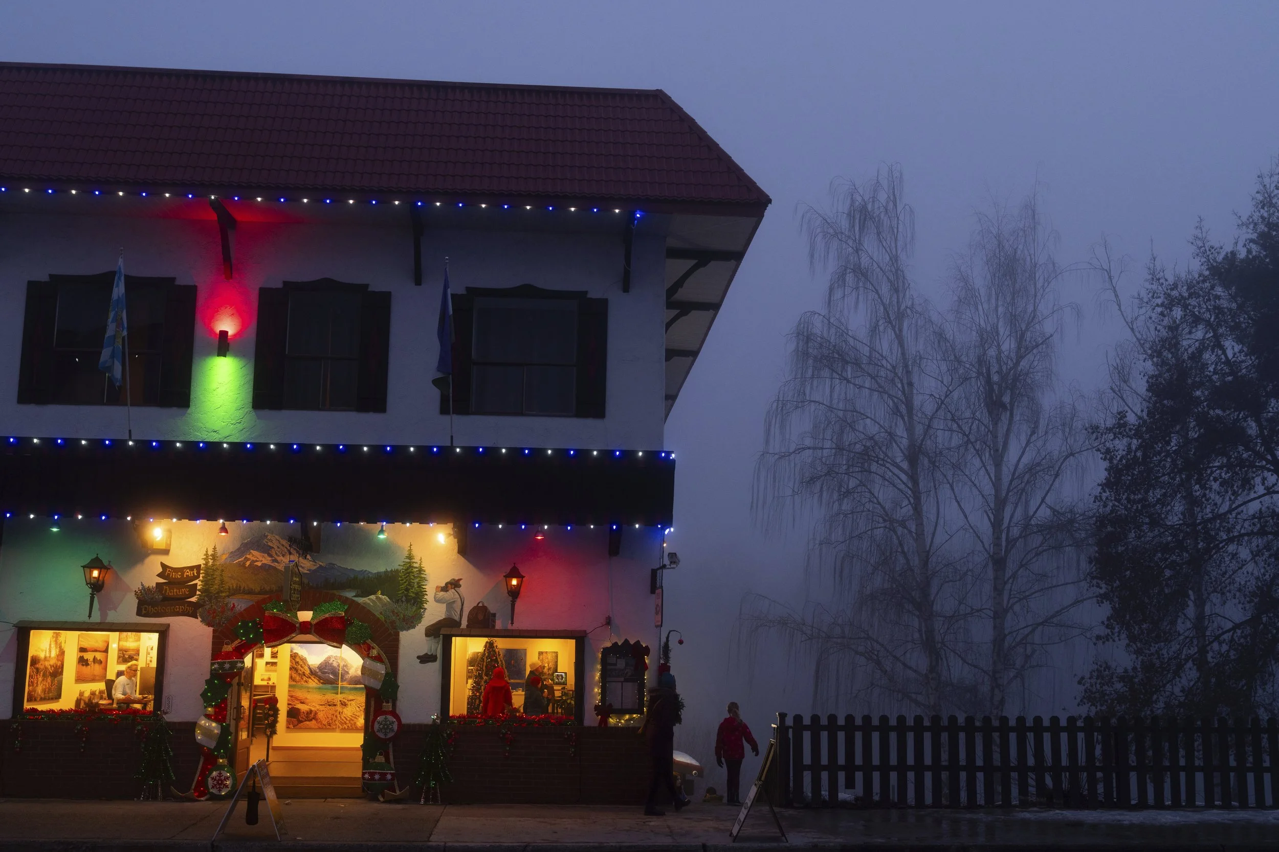 A child looks out into the fog on Tuesday, Nov. 26, 2024, in Leavenworth, Wash. 
