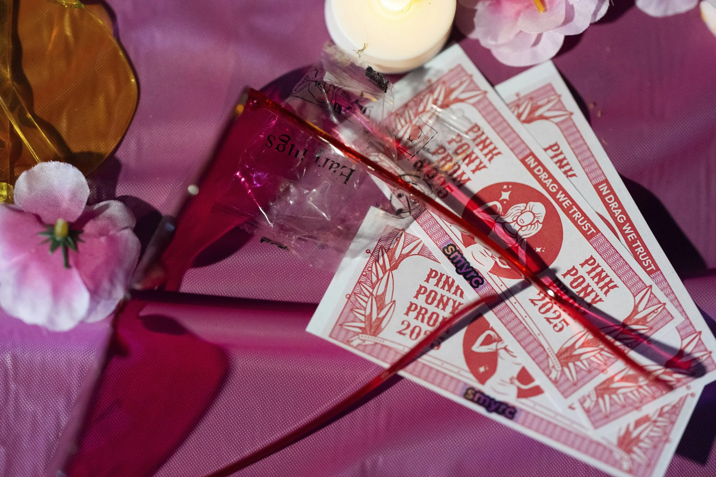 Pink heart-shaped glasses are seen on a table during a “Pink Pony Prom” on Friday, May 30, 2025, in Portland, Ore.
