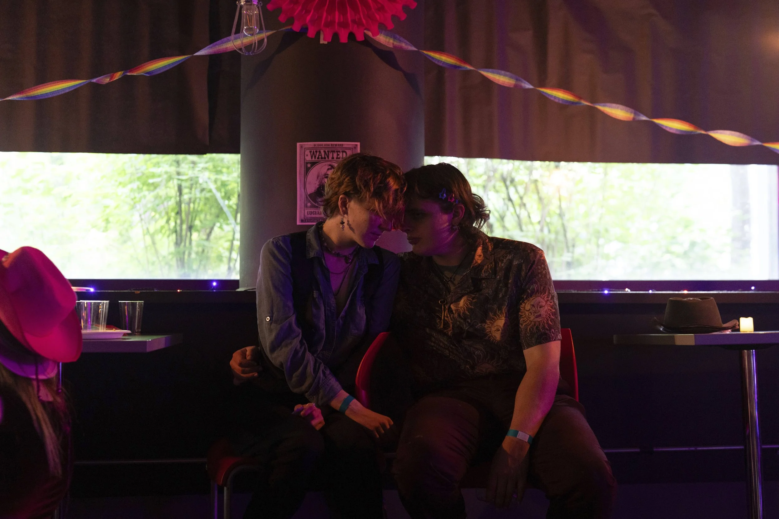 Couple Michael, right, and Perse talk during a “Pink Pony Prom” held to celebrate teen and young adult members of the LGBTQ+ community on Friday, May 30, 2025, in Portland, Ore.