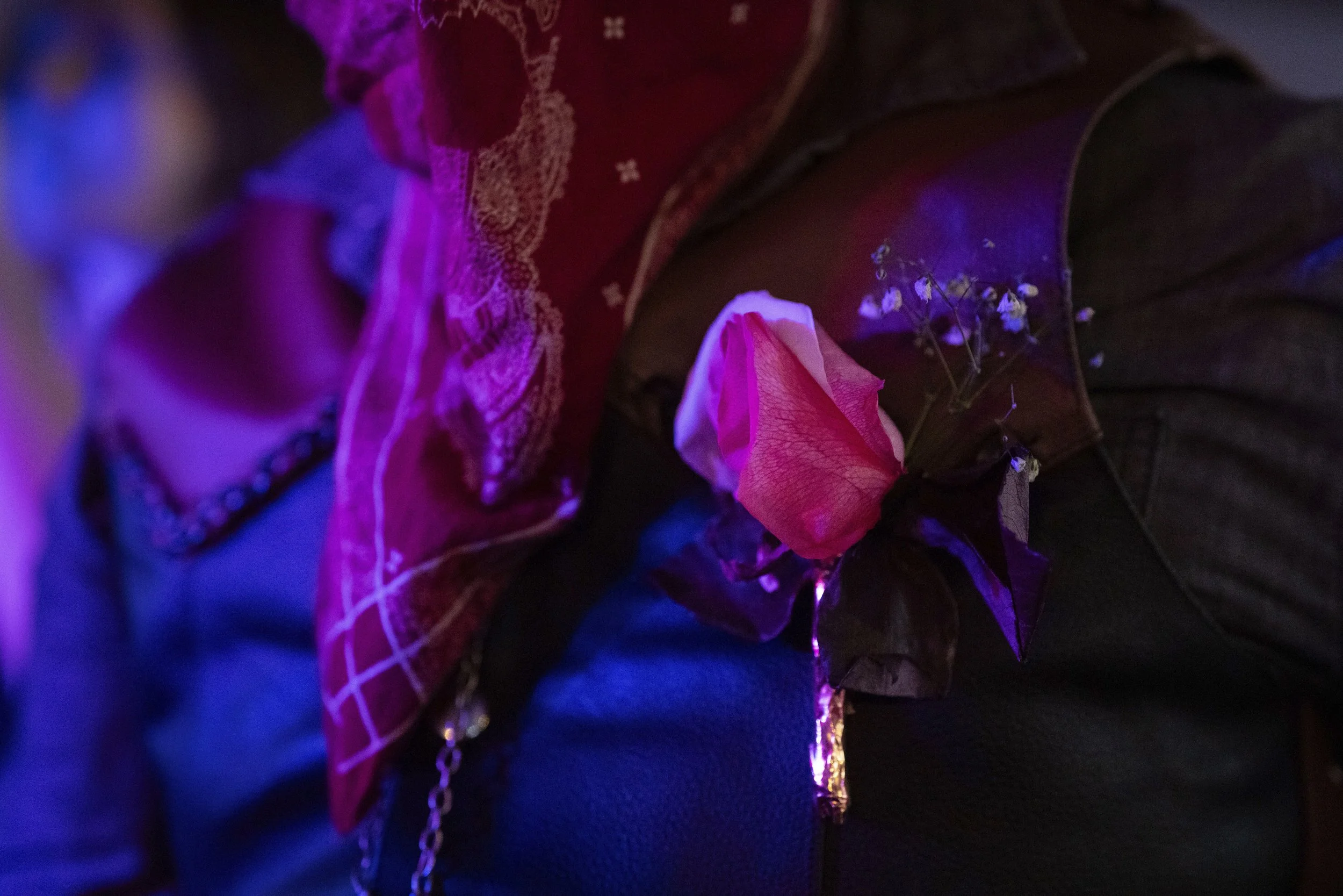 Lennon Sandoval wears a boutonnière that their mom made for them and their date during a "Pink Pony Prom" held to celebrate teen and young adult members of the LGBTQ+ community on Friday, May 30, 2025, in Portland, Ore.