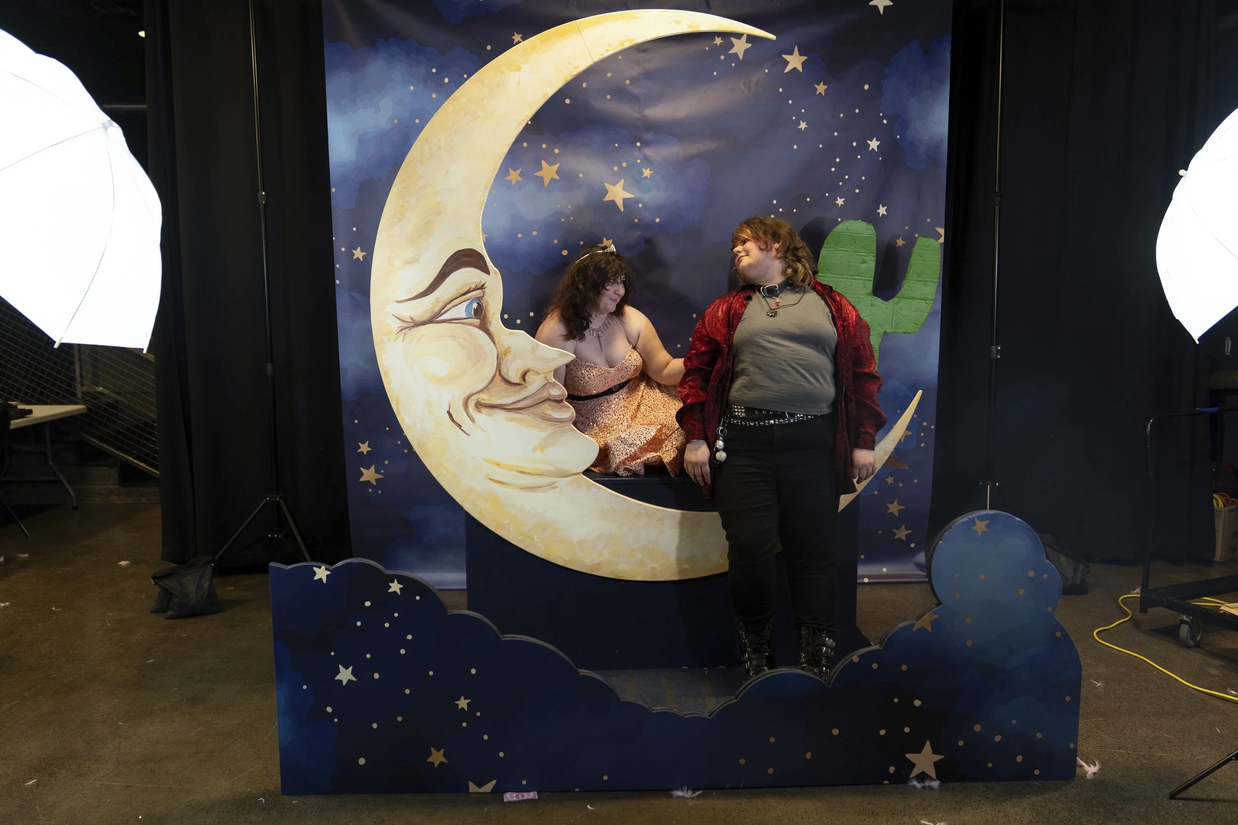 Jason Schubert, left, and Dean Willson, pose for a photo during a “Pink Pony Prom” organized by the Sexual & Gender Minority Youth Resource Center, part of New Avenues for Youth, a nonprofit dedicated to ending youth homelessness. 