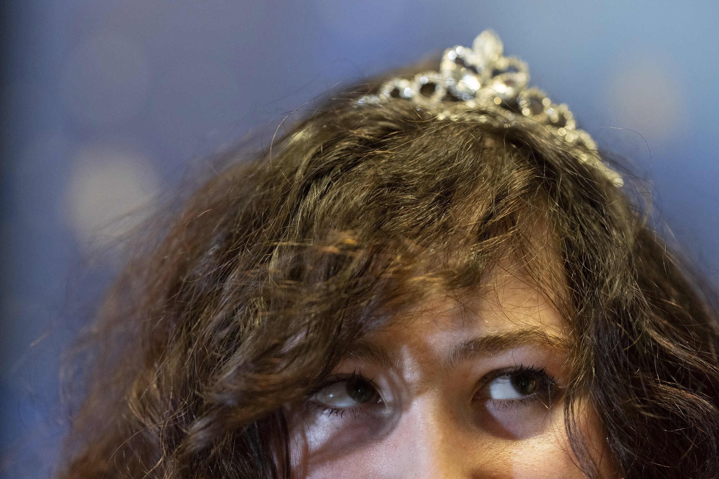 Jason Schubert wears a tiara during a “Pink Pony Prom” on Friday, May 30, 2025, in Portland, Ore. 