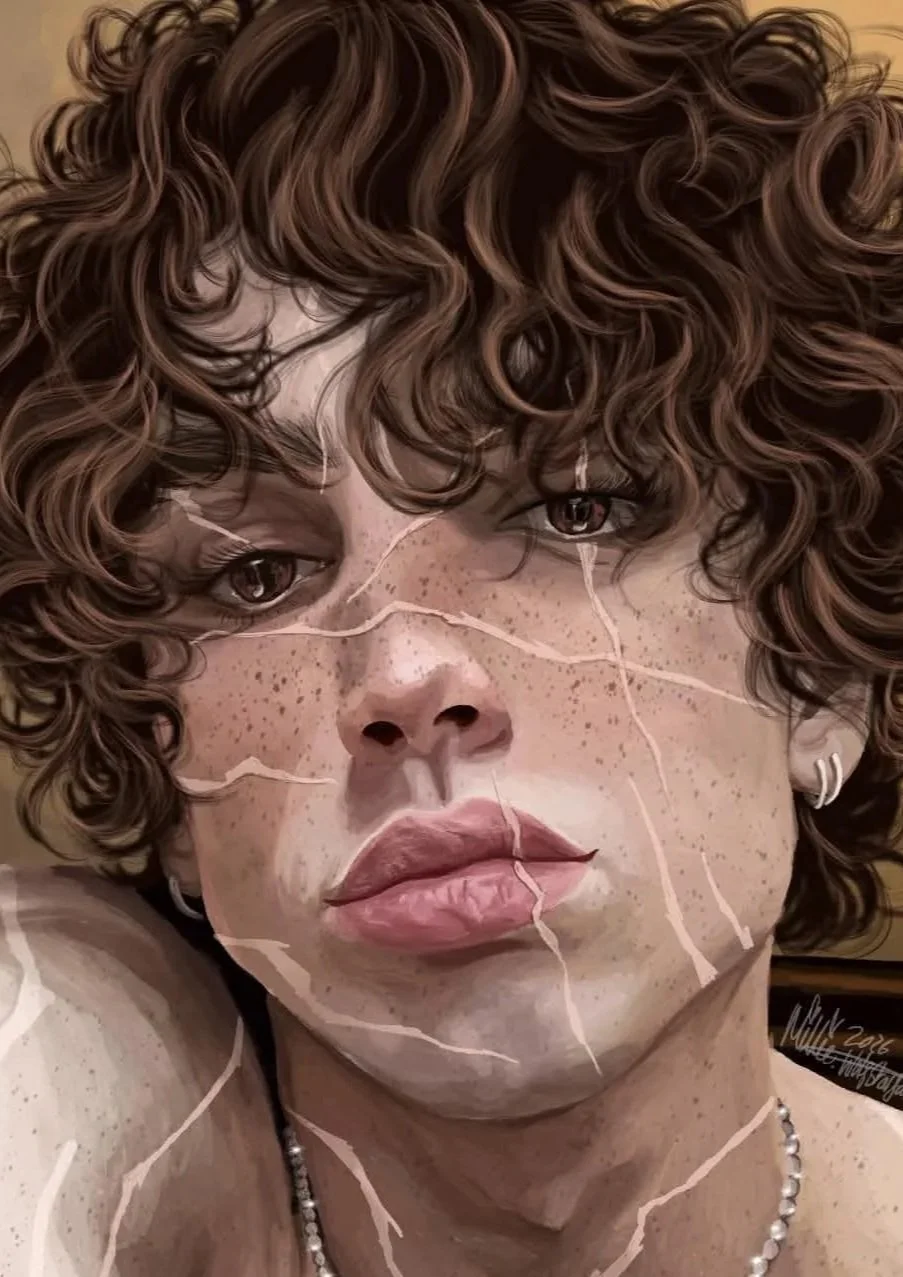 Close-up of a person's face with curly hair, freckles, and full lips, with cracks drawn on the face, resembling a cracked porcelain or ceramic surface.