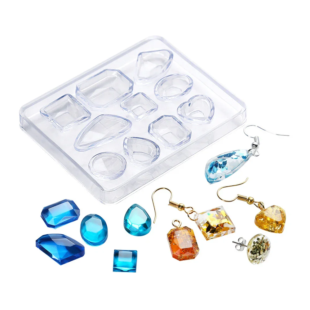 Assorted blue and gold gemstone jewelry with a plastic organizer tray.