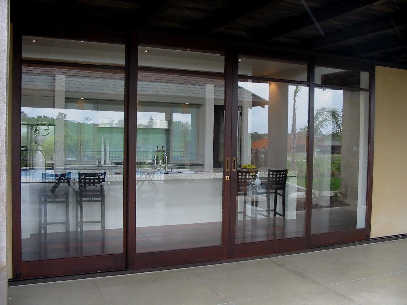 Sliding timber doors in alloy frame.jpg