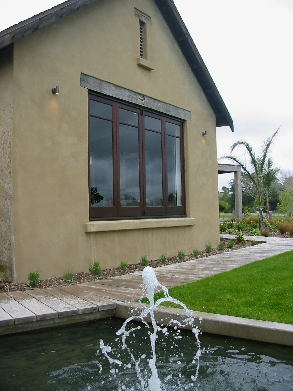 Timber bifold windows in alloy frame.jpg