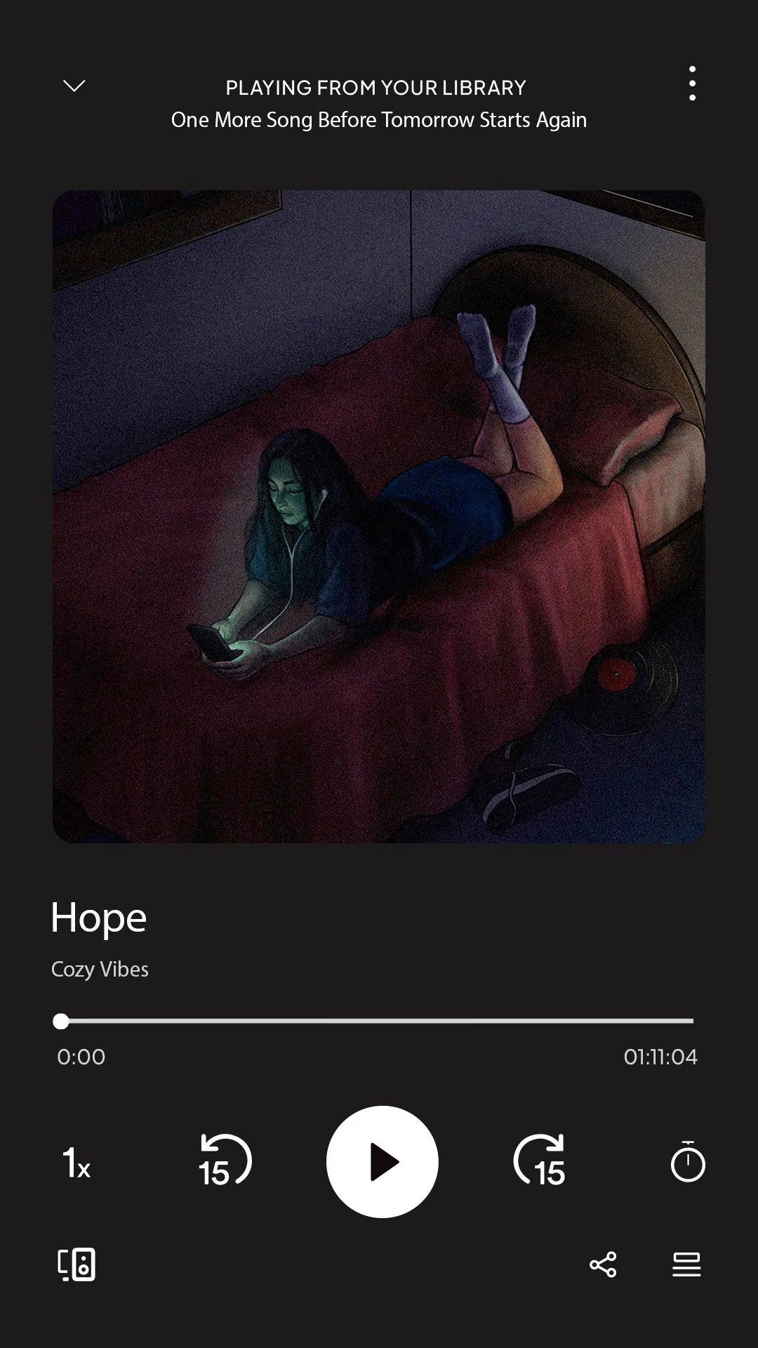 A girl lying on a bed with a red bedspread, looking at a phone, listening to music through earphones, with a vinyl record on the floor near her.