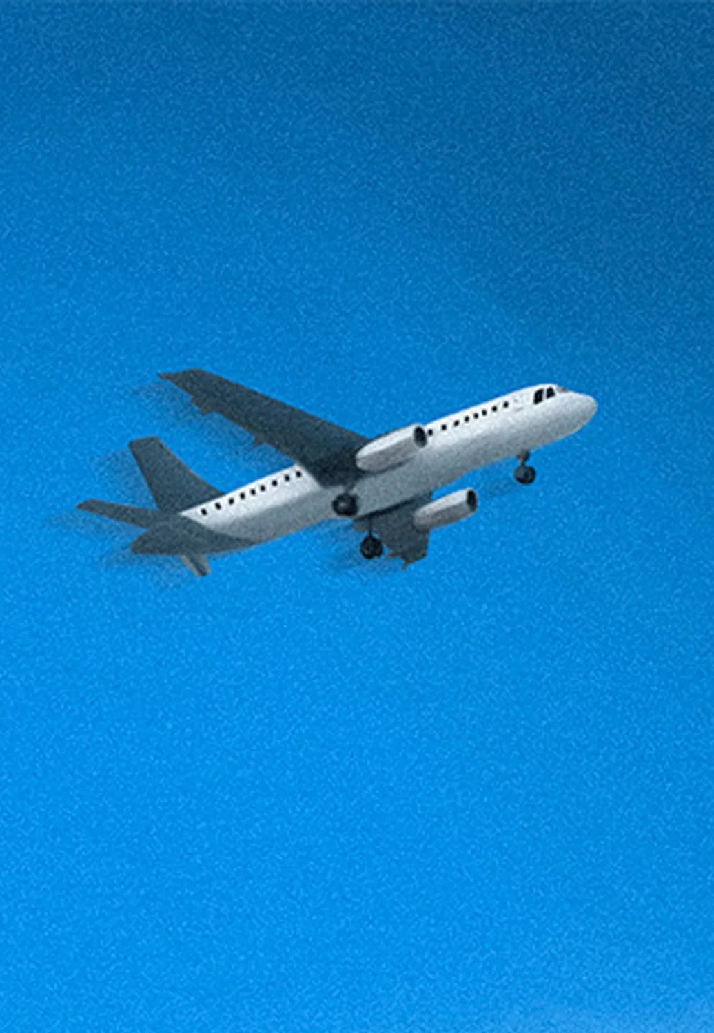 An airplane flying in a clear blue sky.
