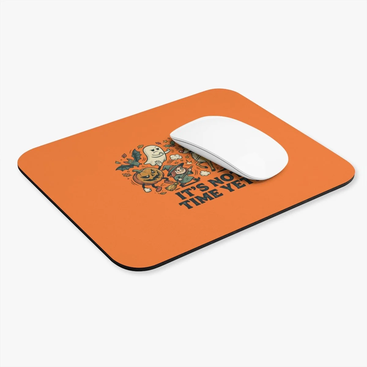 cute orange mouse pad that has Halloween Charters on the front of it letting Santa's helpers that its not time for Christmas yet. Cute and fun for home and work
