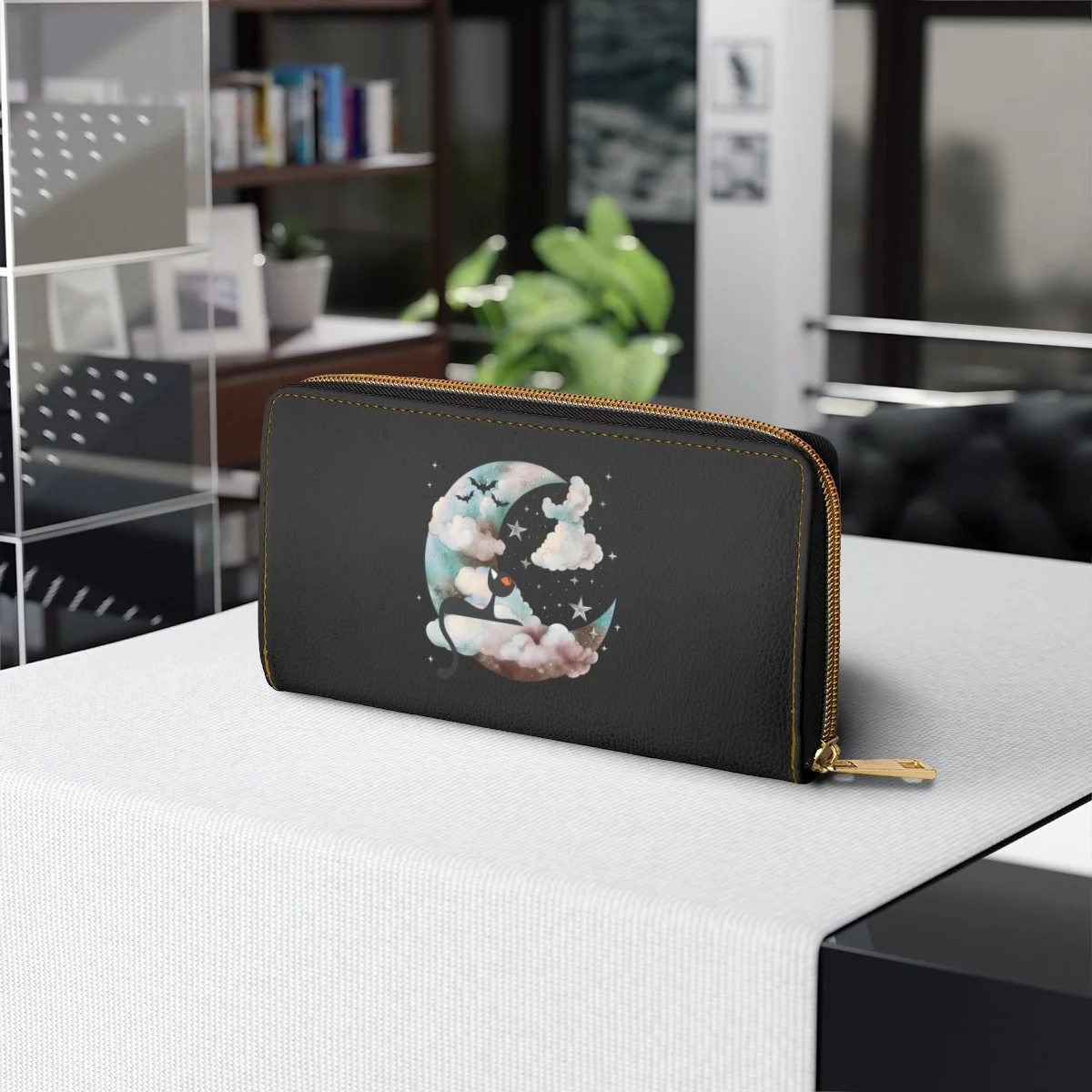 black zipper wallet with a black cat sitting on the moon. complete with clouds and bats in the background