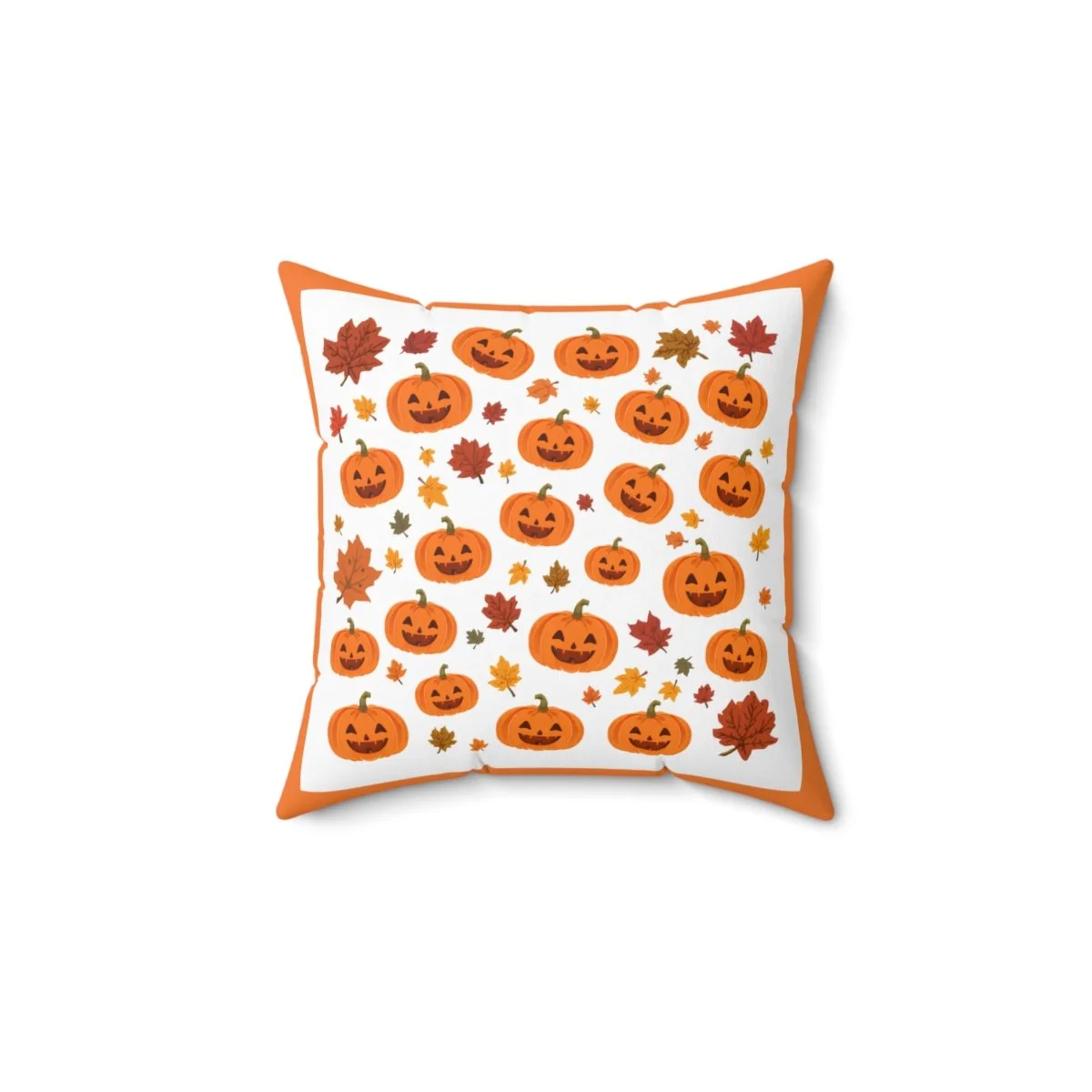 square Pillow with a white background. It has orange, red, green leaves and happy orange pumpkins though out the pillow