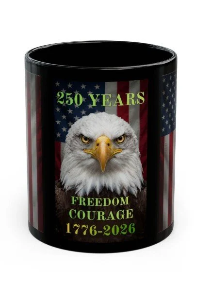 A black mug featuring an American flag, an eagle's head, and text celebrating 250 years of American independence, from 1776 to 2026, with words '250 Years,' 'Freedom,' and 'Courage.'