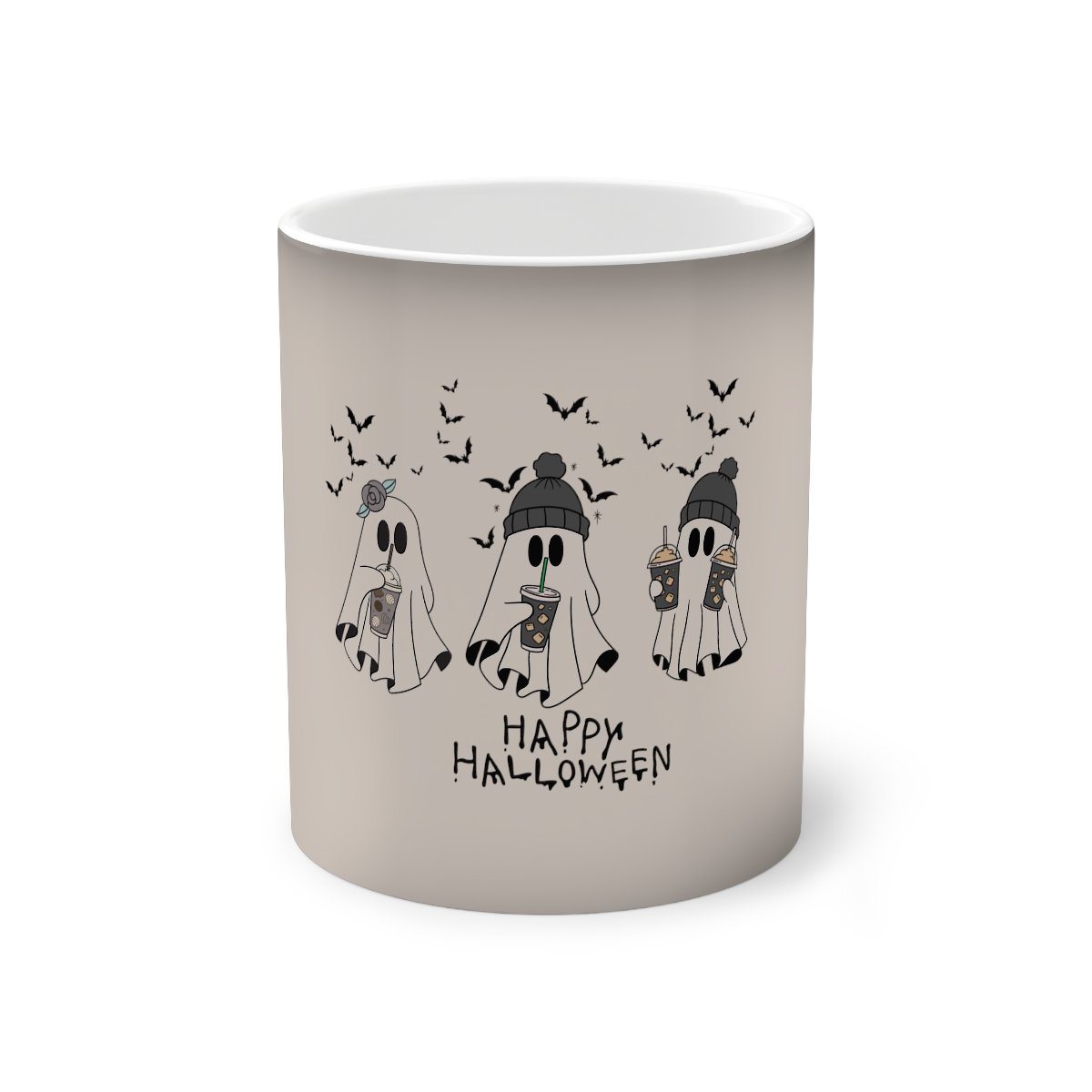 color changing mug with cute 3 cute ghosts on the front drinking coffee and bats flying in the background. Happy Halloween is written below the ghost