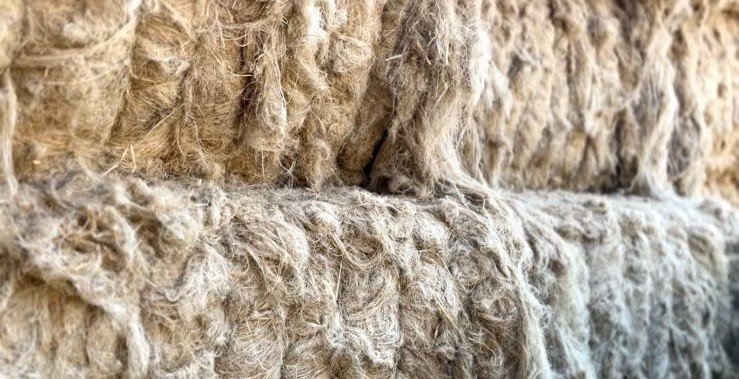 Close-up of beige, fibrous insulation material.