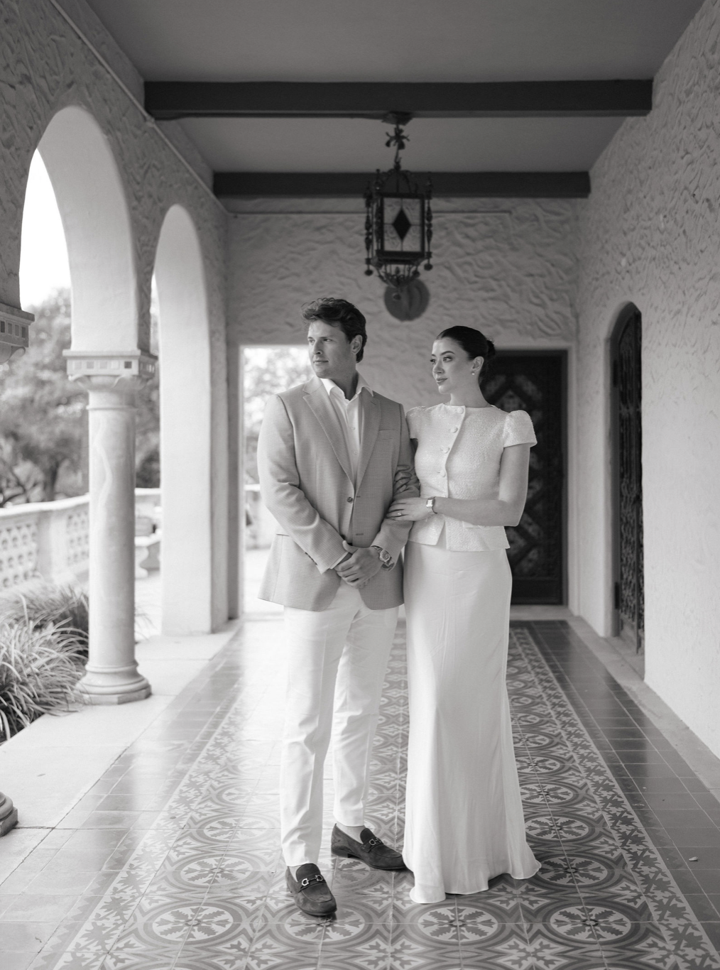 Laurie’s customers, Fernando and Kate embracing by the lake on their wedding day.