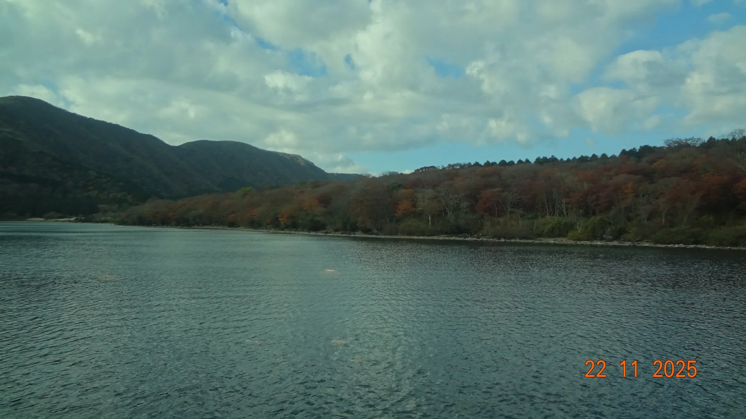 A lake view with mountains. Image taken on a cruise through Lake Ashi.