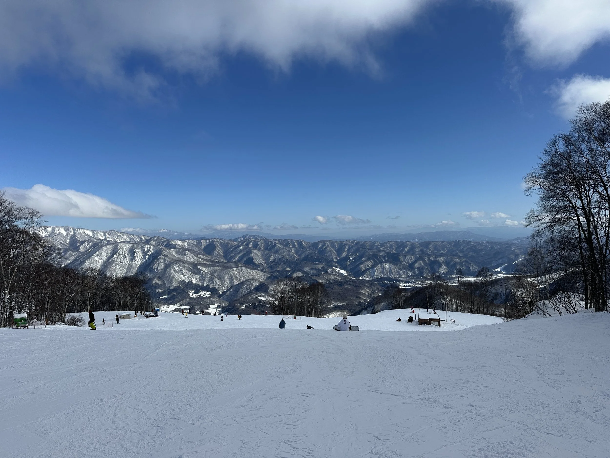 A view from atop a slope in the Tsugaike Ski Resort of Hakuba Village, Japan taken by a TokudAw team member on a bluebird ski day in Japan.