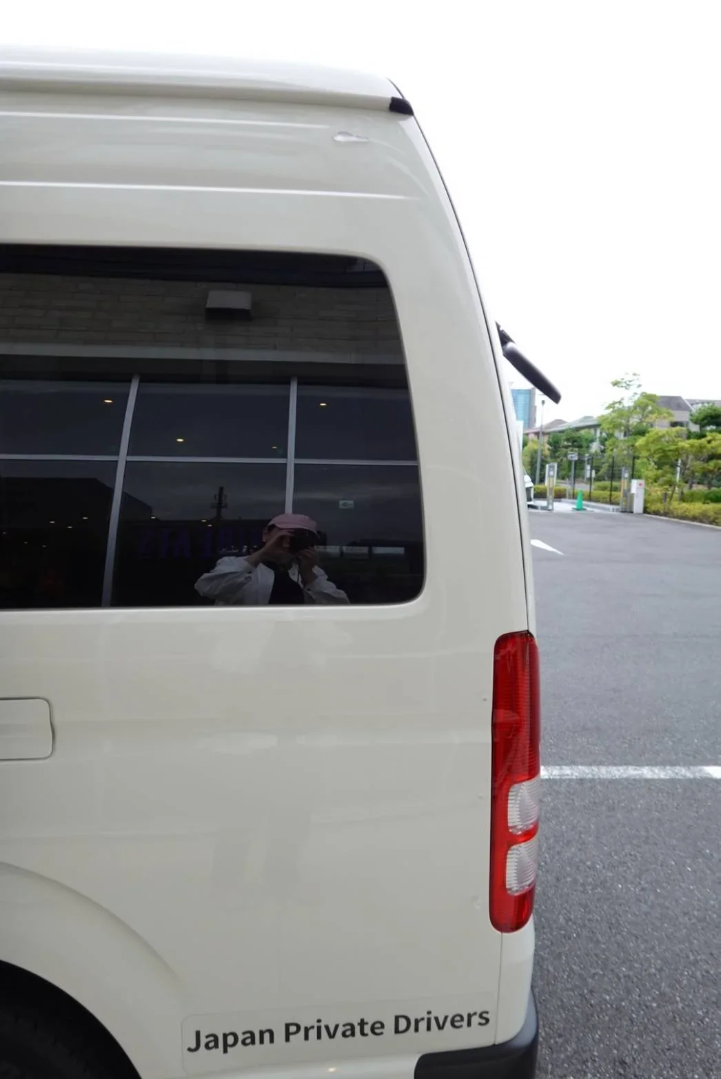 Up close image of the back rear lights of a TokidAw Japan Private Driver Fleet Vehicle.