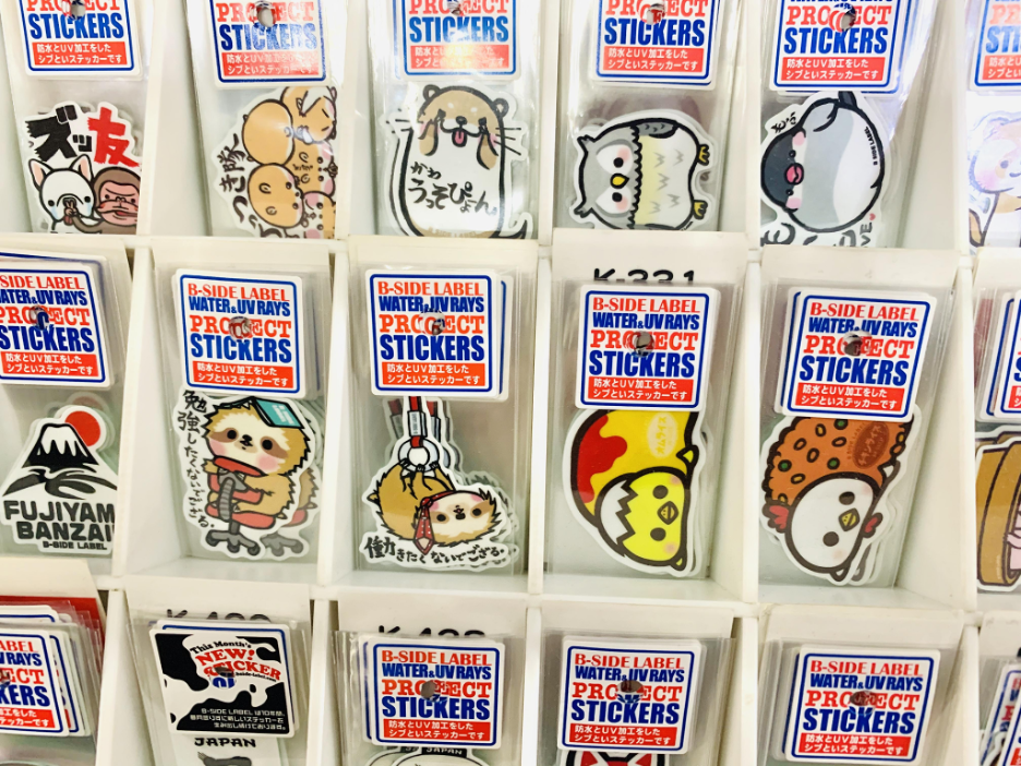 A collection of cute animal stickers including birds, and otters with Japanese characters.