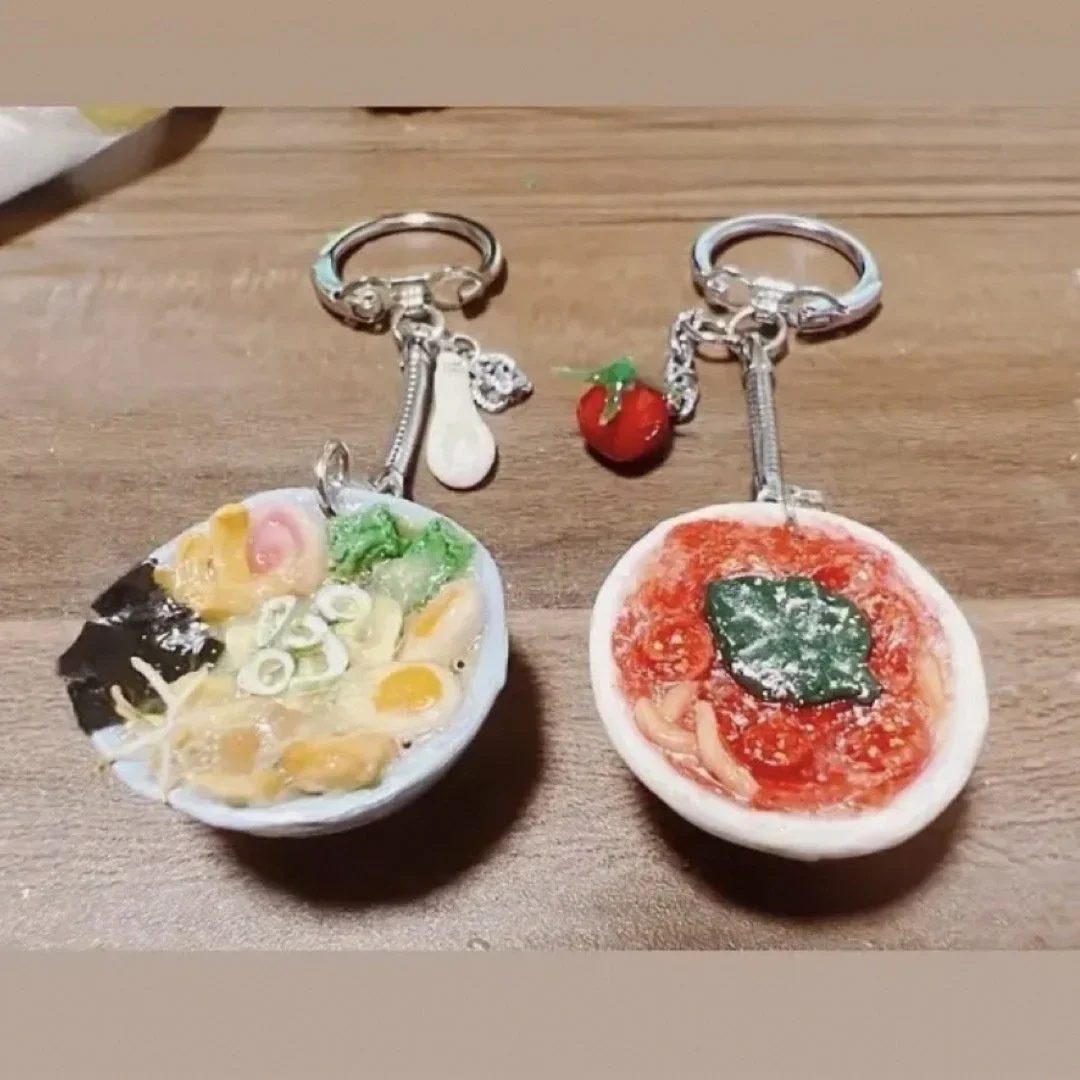 Two fake food mini ramen bowl key chairs.
