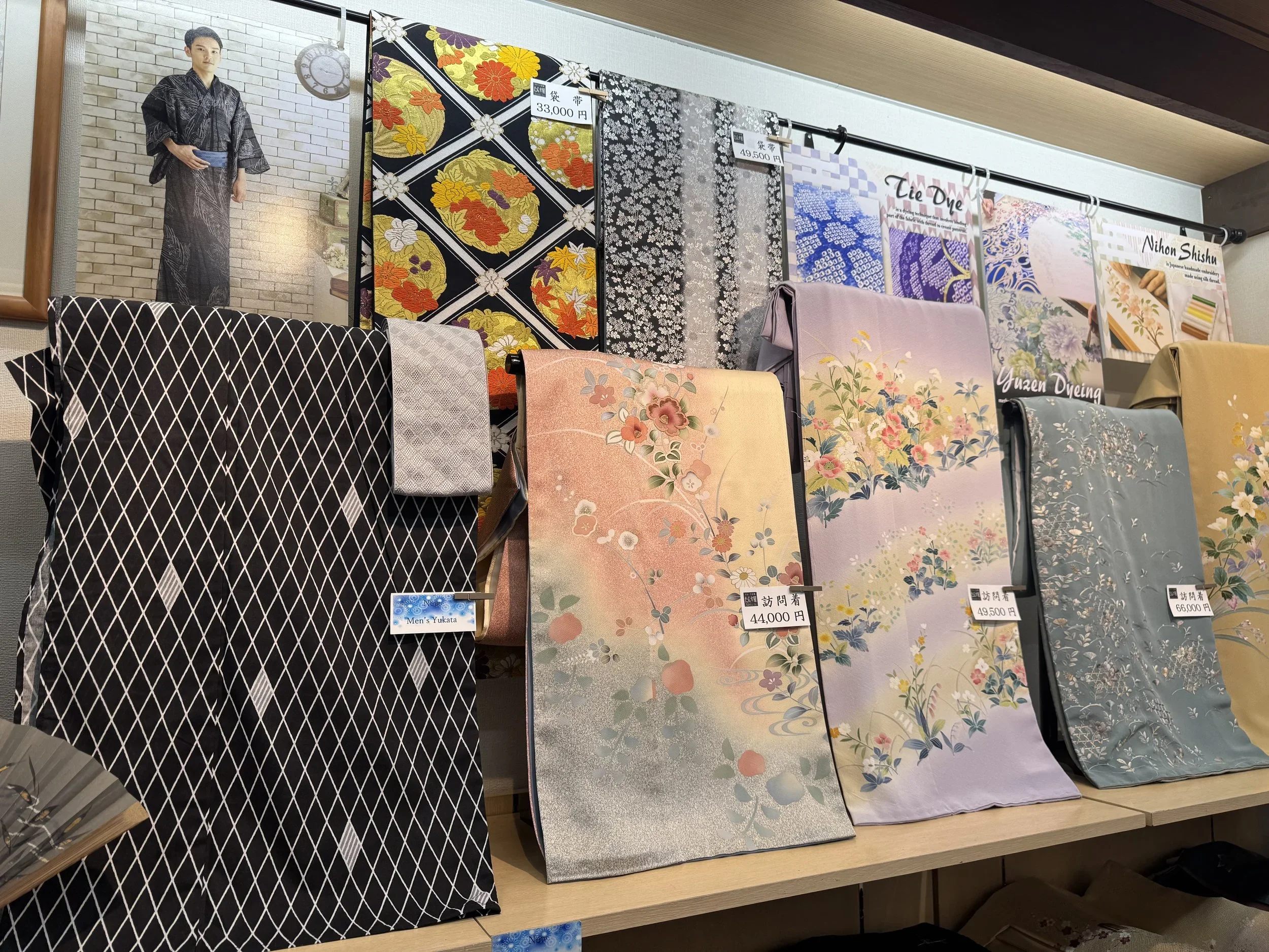 Silk kimonos displayed in a kimono store in Japan.