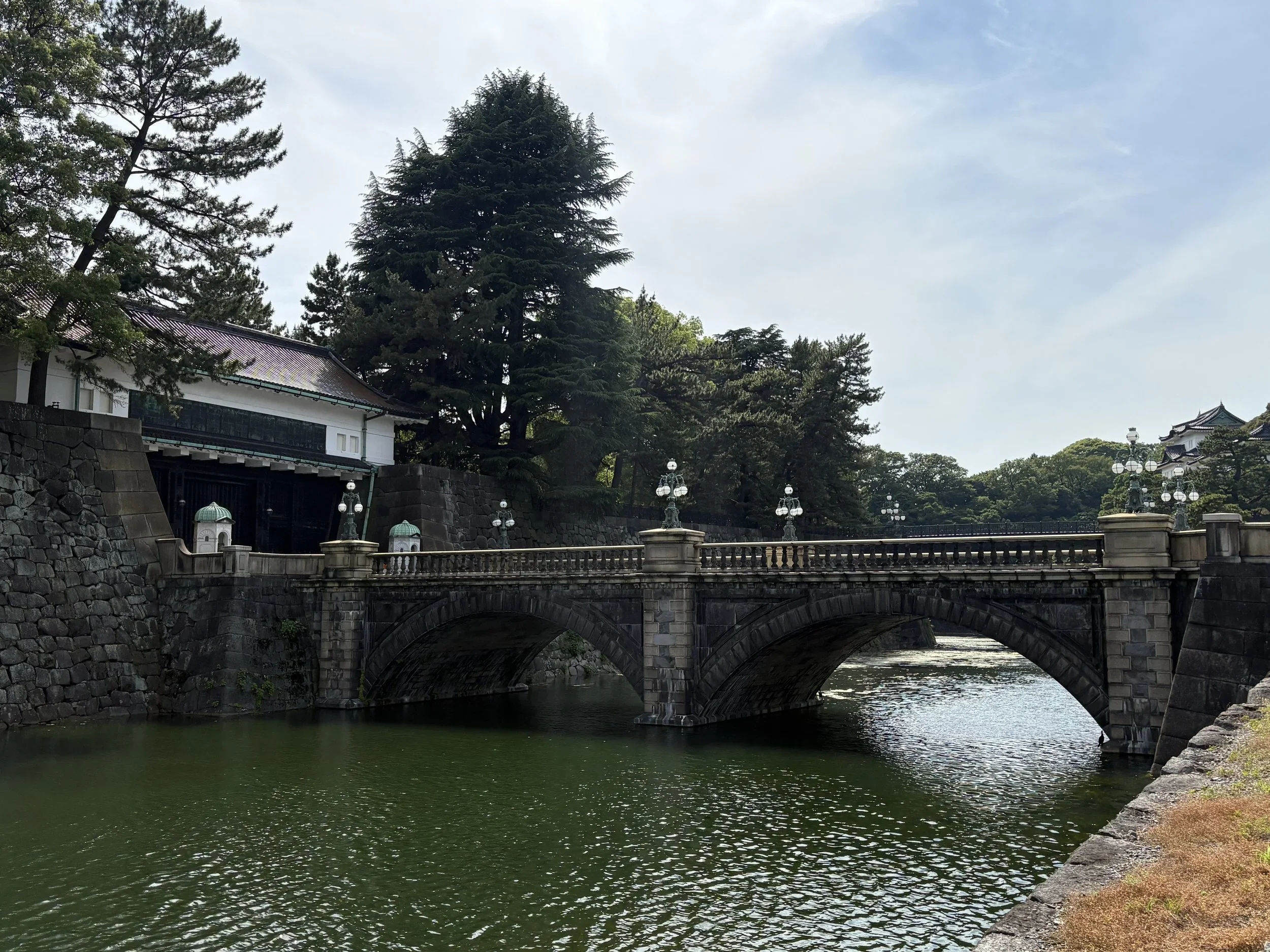 A example of a stone Japanese bridge at the Imperial palace in Tokyo, Japan.