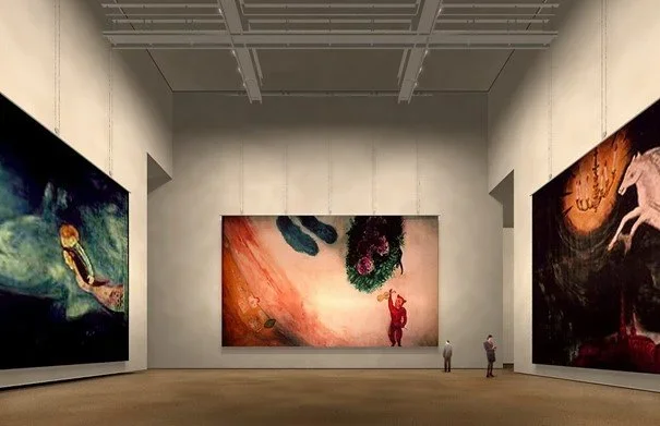 Art museum with 3 large scale paintings in view.
