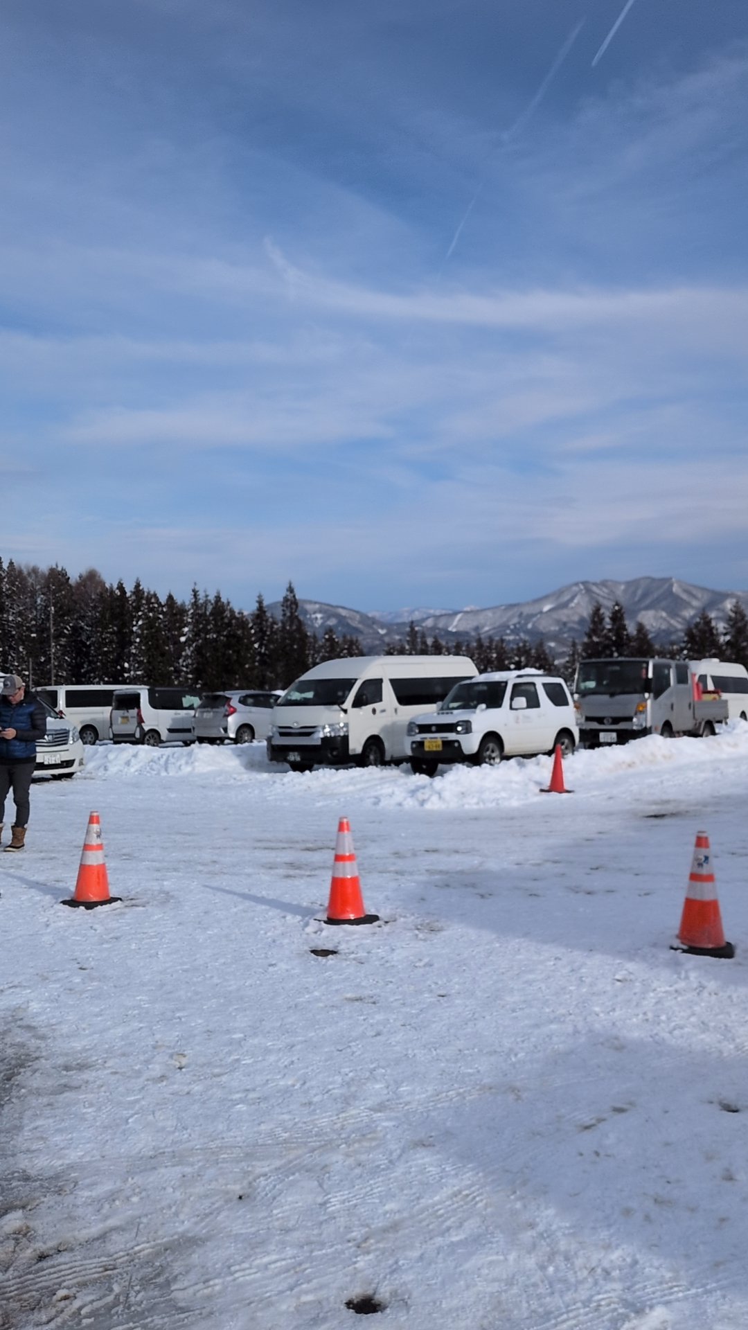 Company van parked in a snowy parking lot