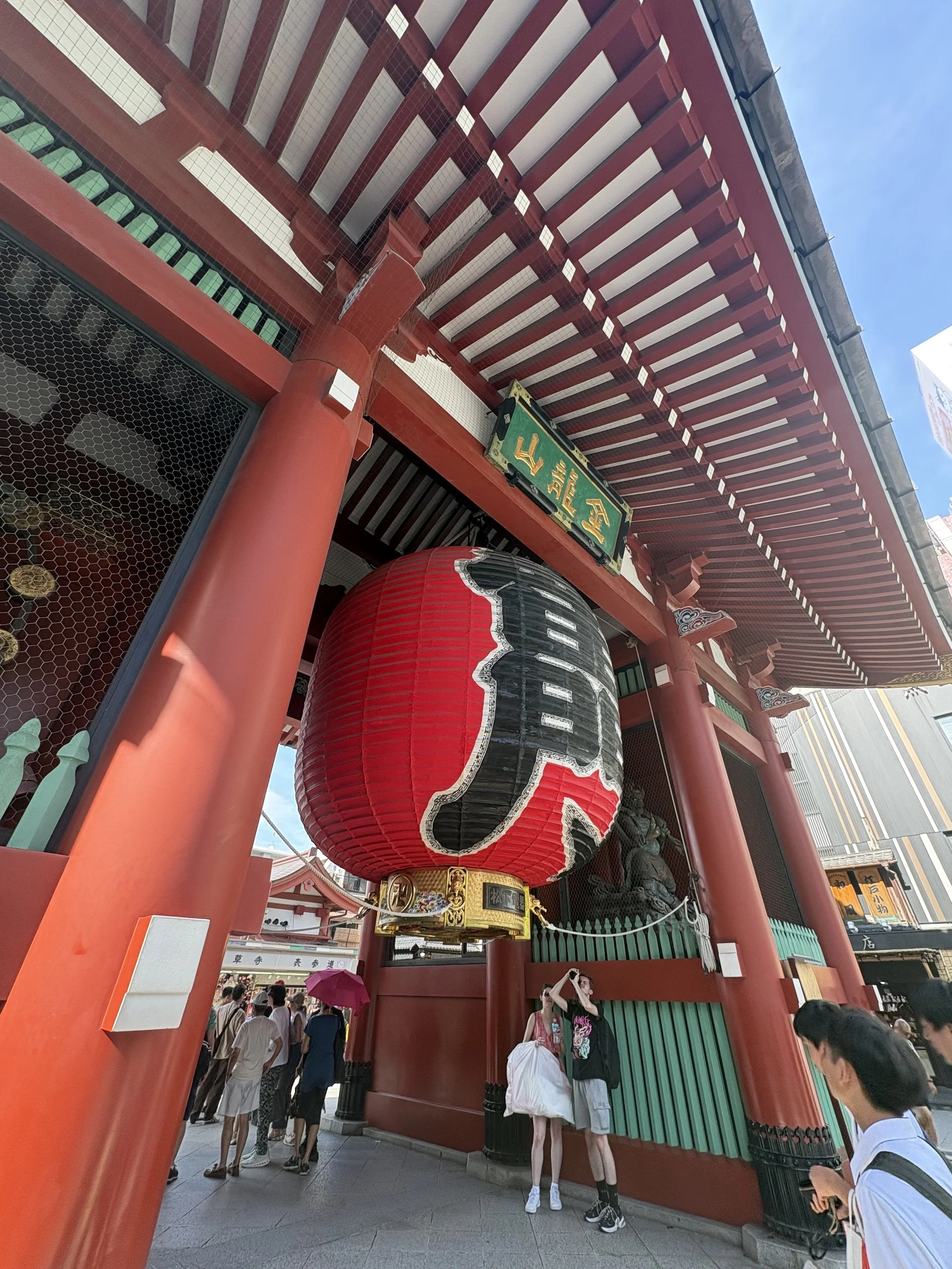 An image of the red lantern hanging from the temple gates at Senso-ji in the Asakusa area of Tokyo, Japan.