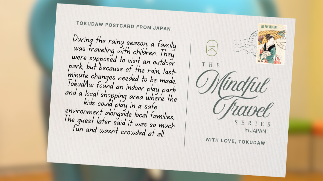 Postcard image with a note that reads: During the rainy season, a family was traveling with children. They were supposed to visit an outdoor park, but because of the rain. TokudAw found an indoor park and local shopping area  where the kids played.