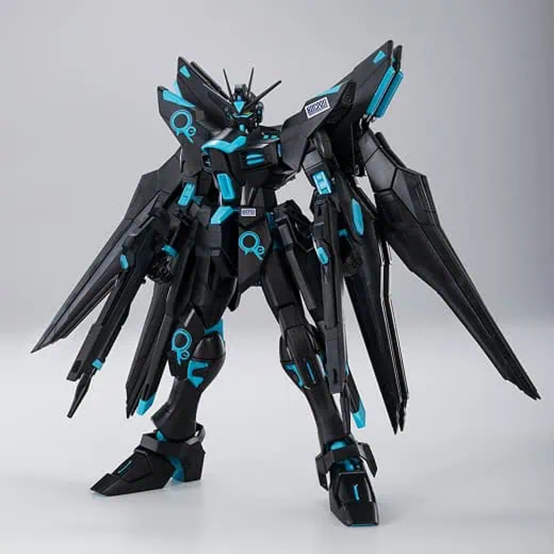 A black and blue spiked Gundam action figure model.