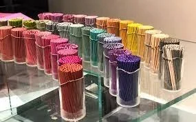 Colorful Japanese incense displayed in a store.