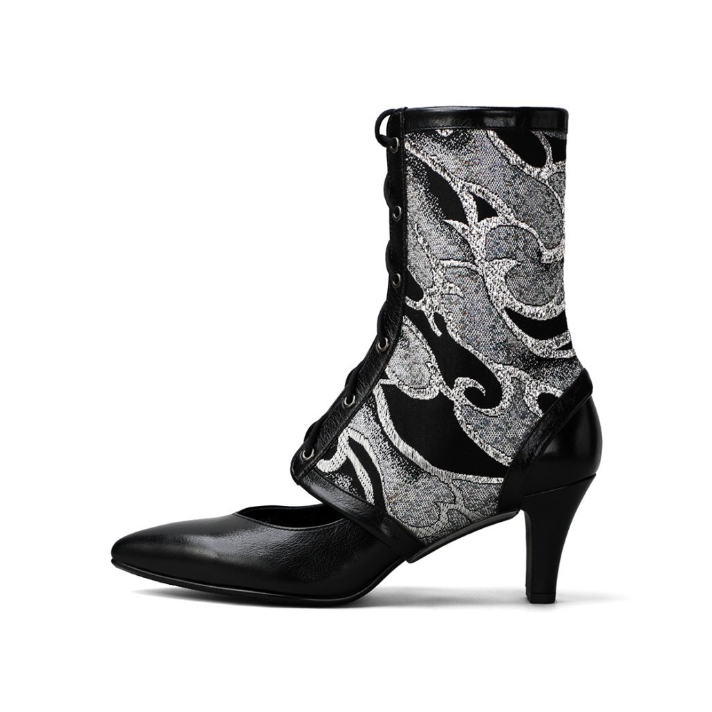 A black high-heel with a kimono's obi fabric ankle brace.